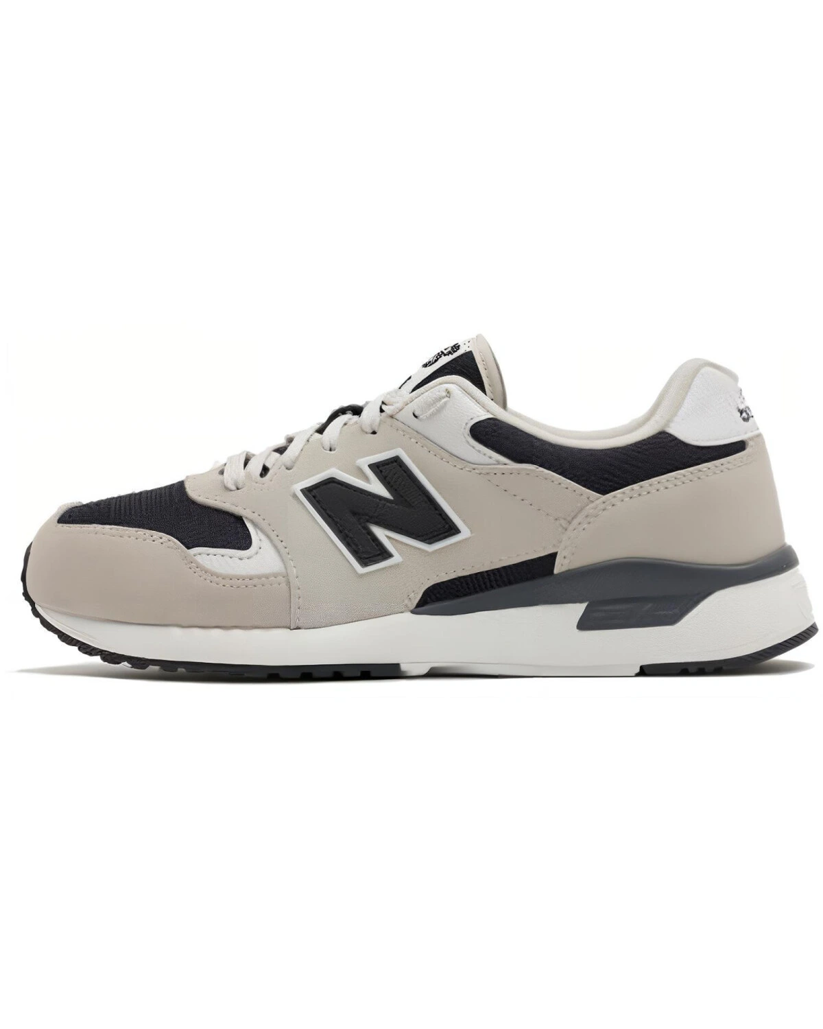 New Balance 570 унисекс кроссовки бежевые с черными вставками картинка