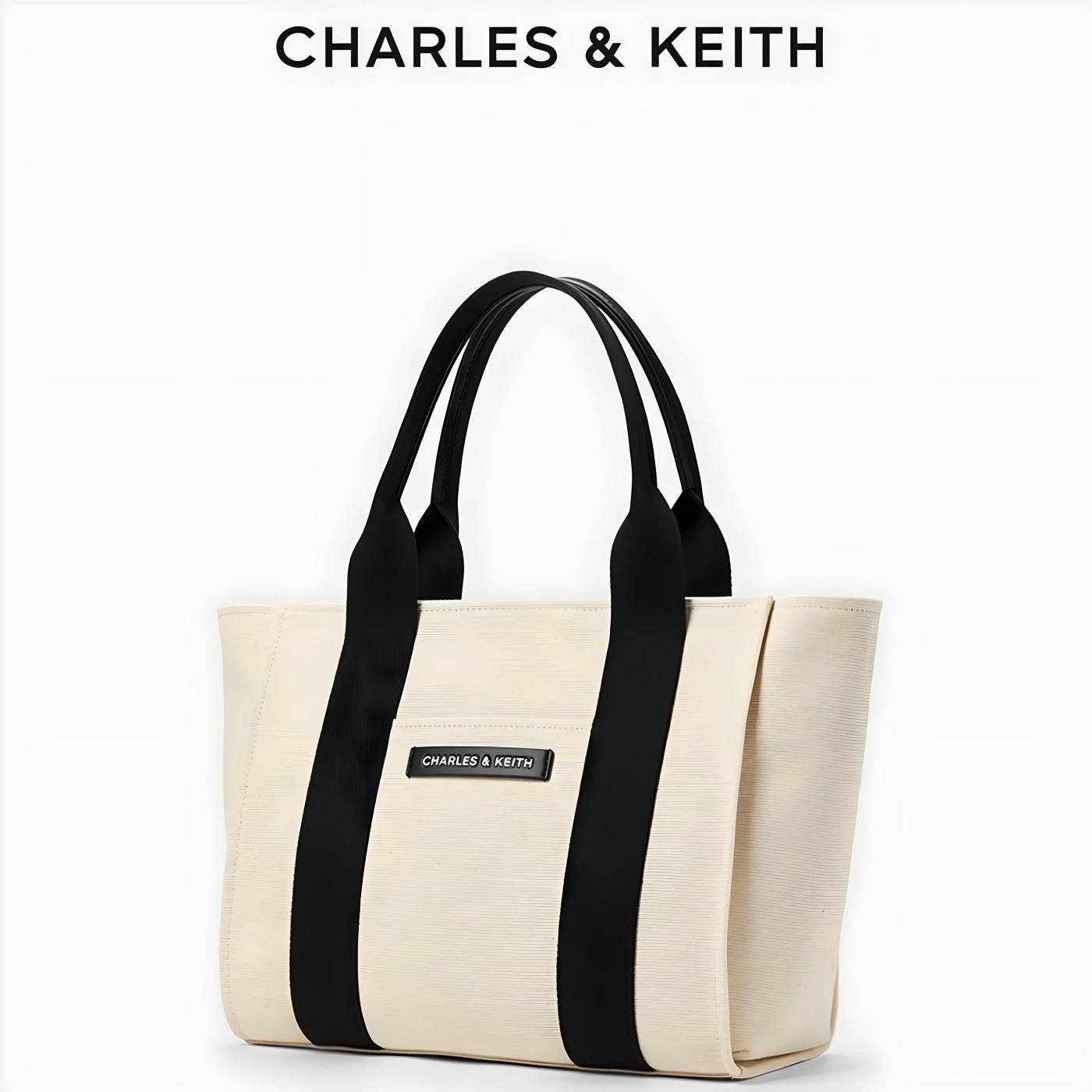 Портативная вместительная сумка CHARLES&KEITH картинка