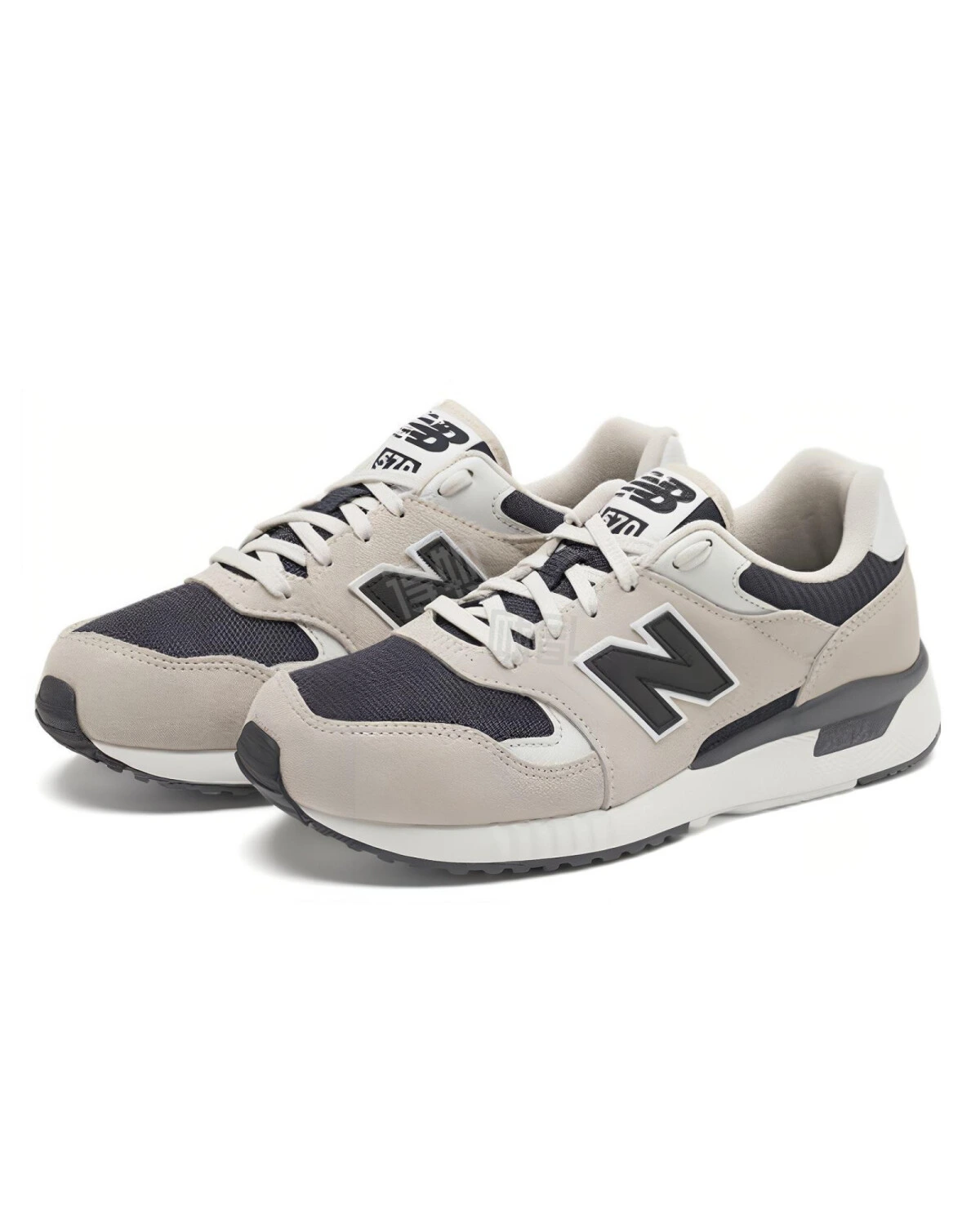 New Balance 570 унисекс кроссовки бежевые с черными вставками картинка