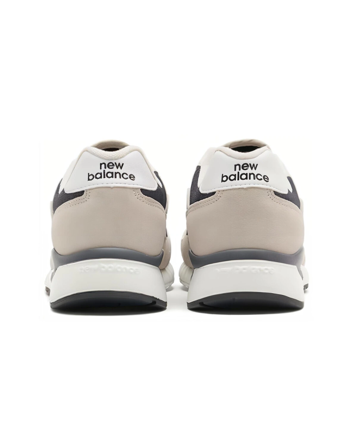 New Balance 570 унисекс кроссовки бежевые с черными вставками картинка